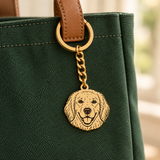 Single pet portrait keychain attached to a canvas bag